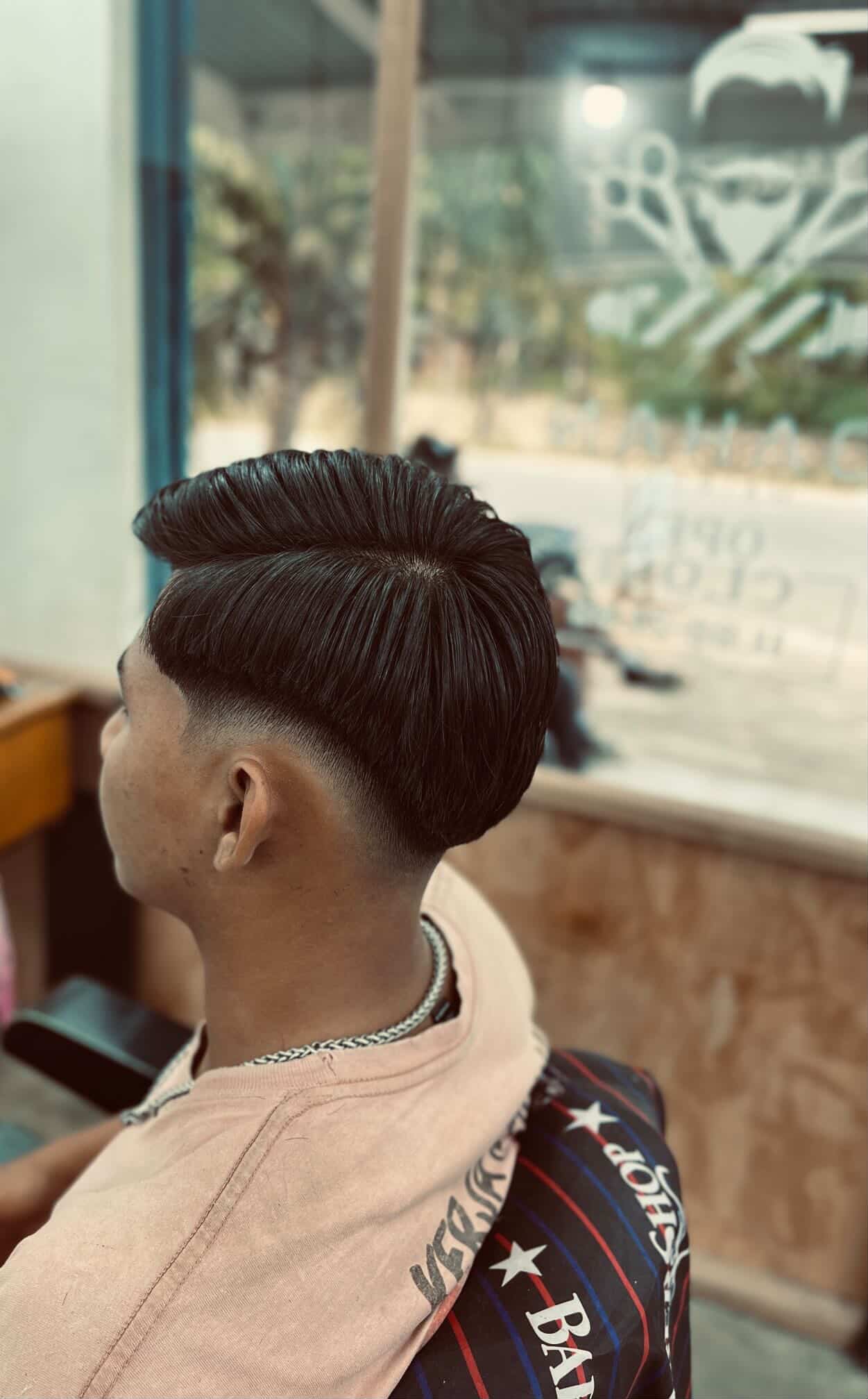 Barber cutting hair